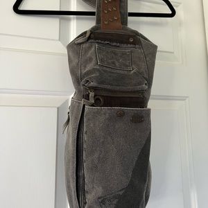 Free People distressed canvas sling bag.